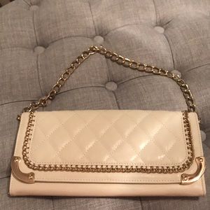 Cream quilted print clutch